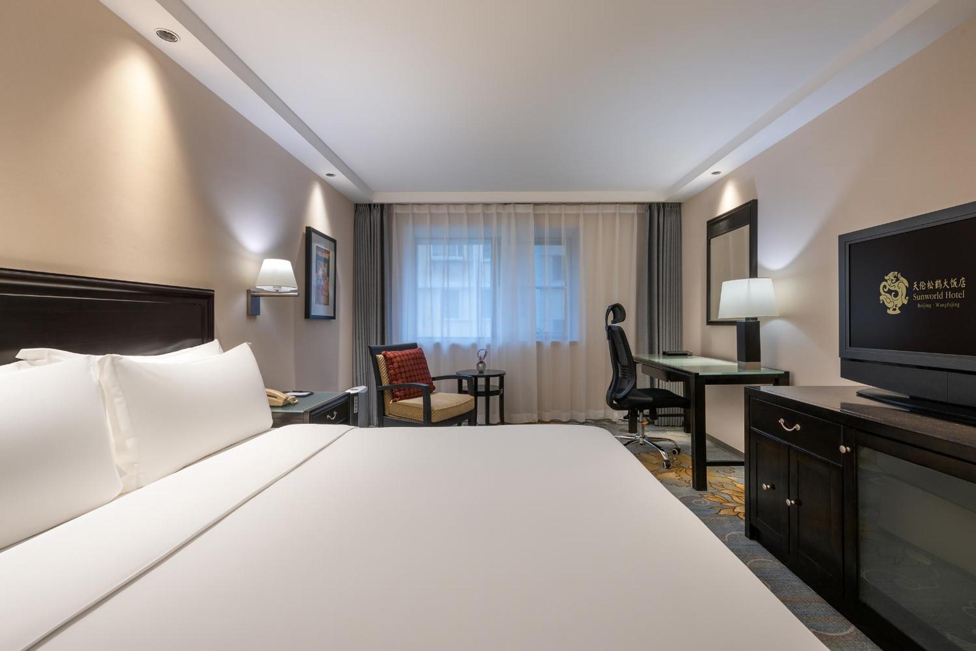 โรงแรมซันเวิลด์ หวางฟูจิง โรงแรม 4*